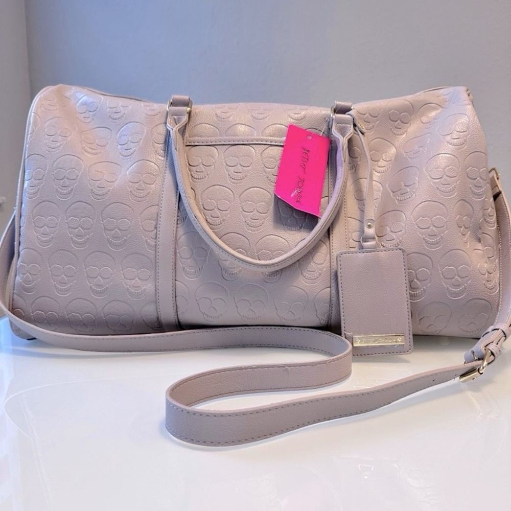 Betsey Johnson Grey XOSpeedy  Skulltastic skull embossed duffel bag